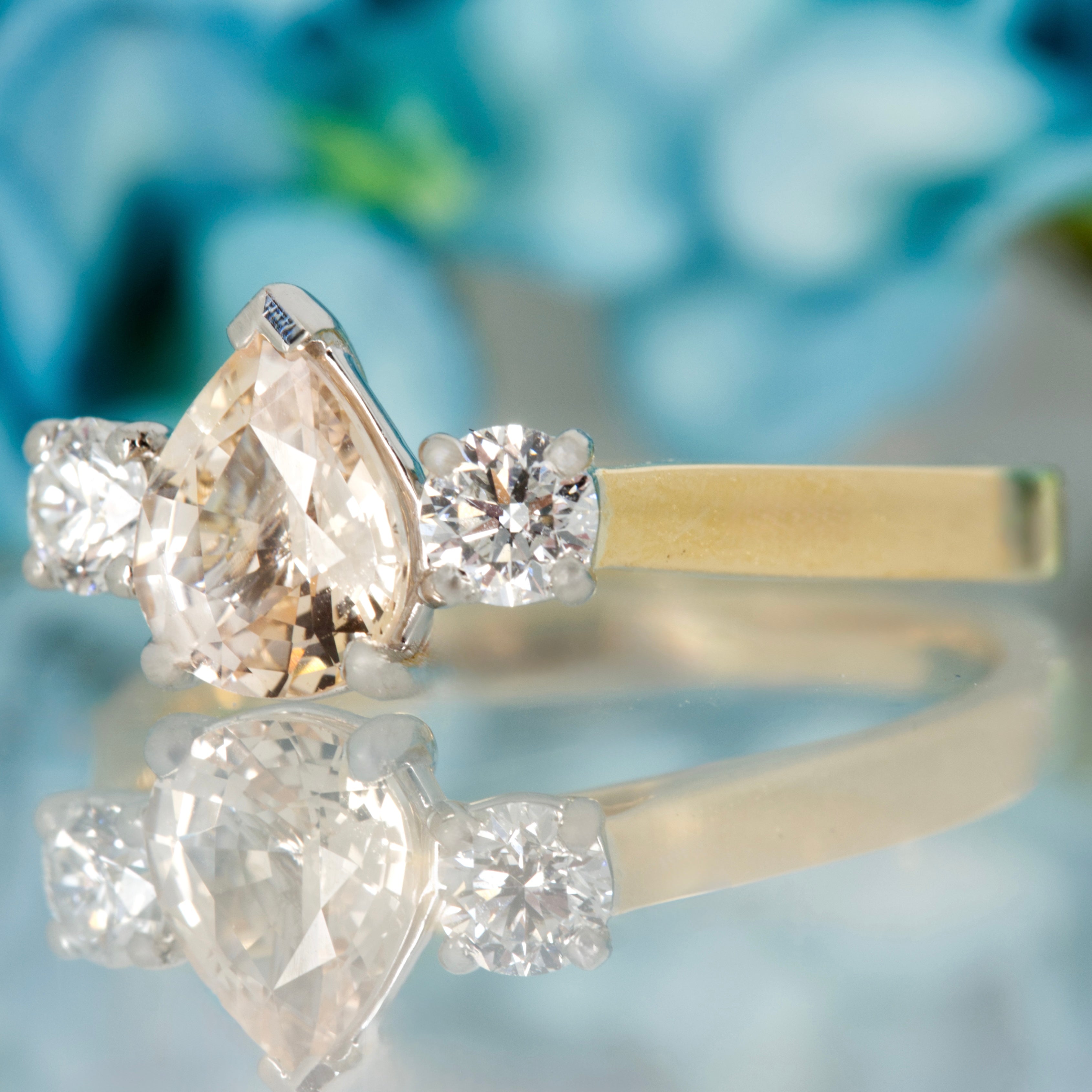 18ct Yellow Gold Pear Cut Blush Sapphire & Round Brilliant Cut Diamond Trilogy Ring