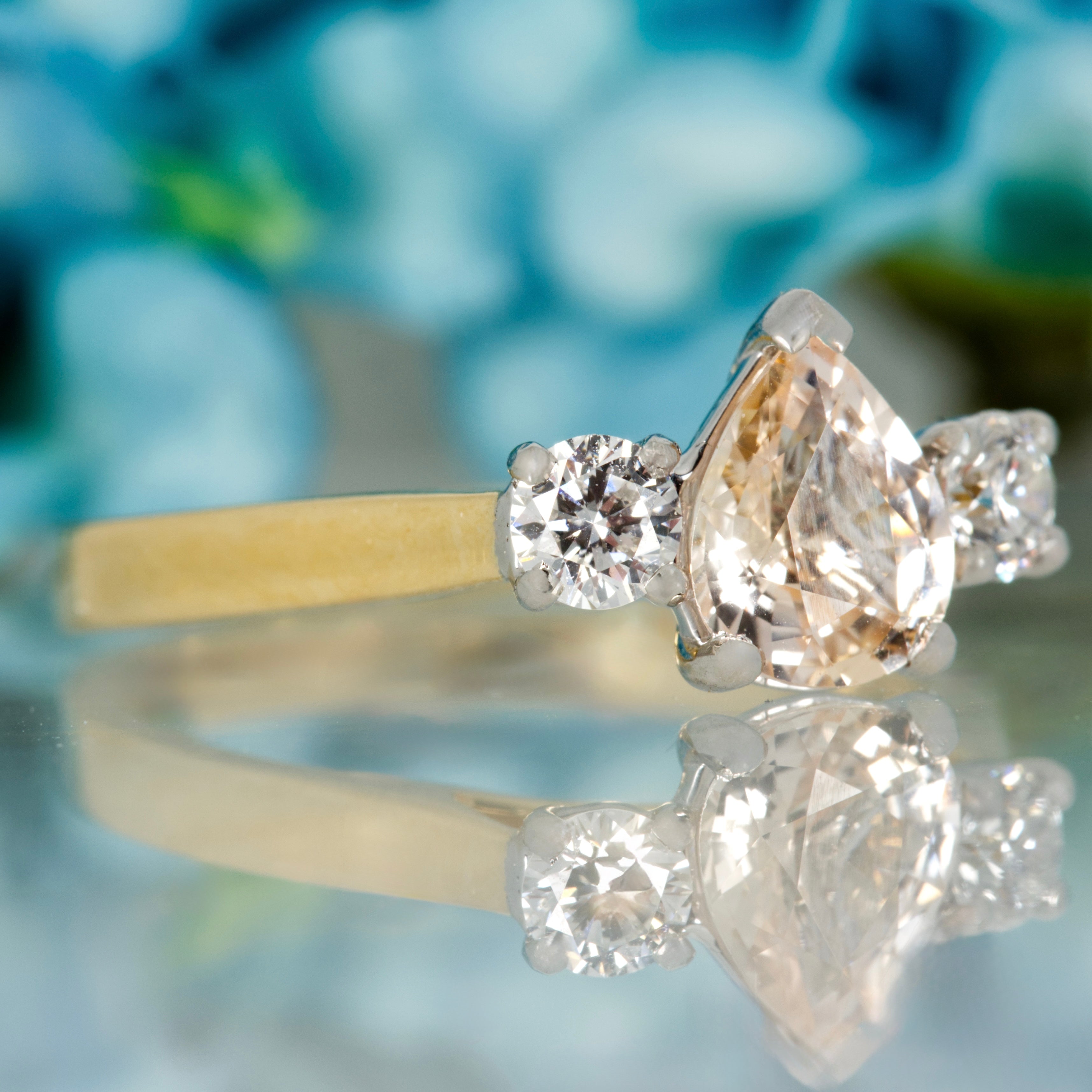 18ct Yellow Gold Pear Cut Blush Sapphire & Round Brilliant Cut Diamond Trilogy Ring